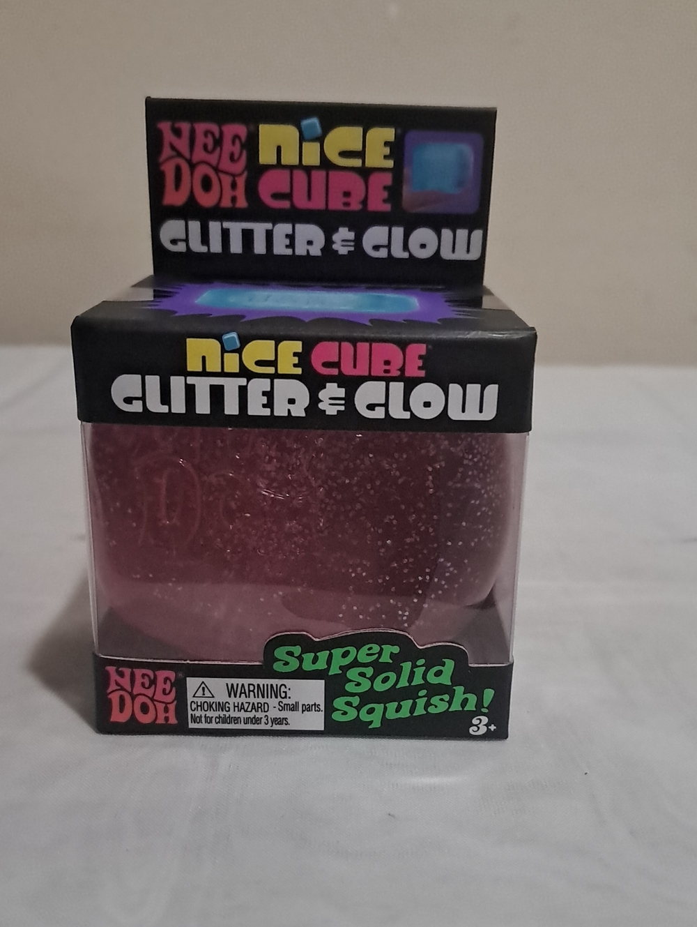 Nice Cube Glitter & Glow Squish Toy - Pink